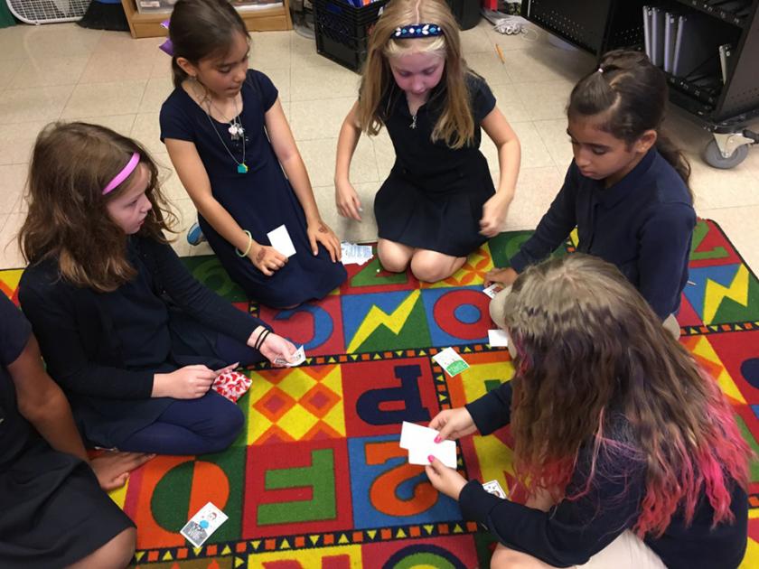 Stratton students play a game designed by a classmate