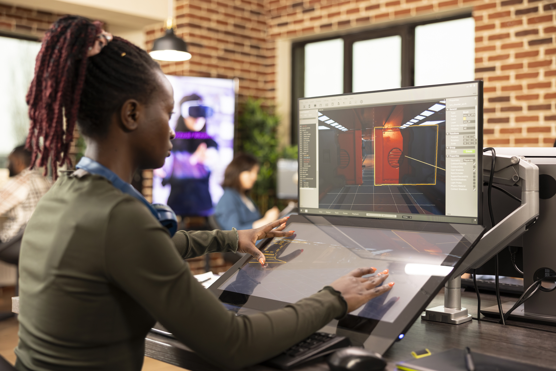 girl sitting at a computer in class