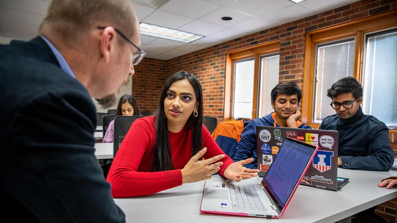 MSIM students talk to Ted Underwood in classroom