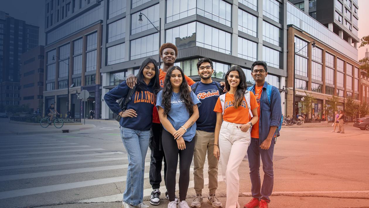 students stand outside the Hub building