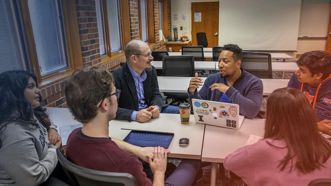 Ted Underwood with students in classroom