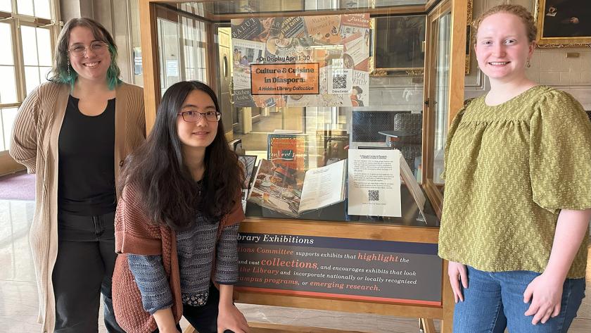 Elizabeth Workman, Yung-hui Chou, and Alice Tierney-Fife in front of their winning exhibit