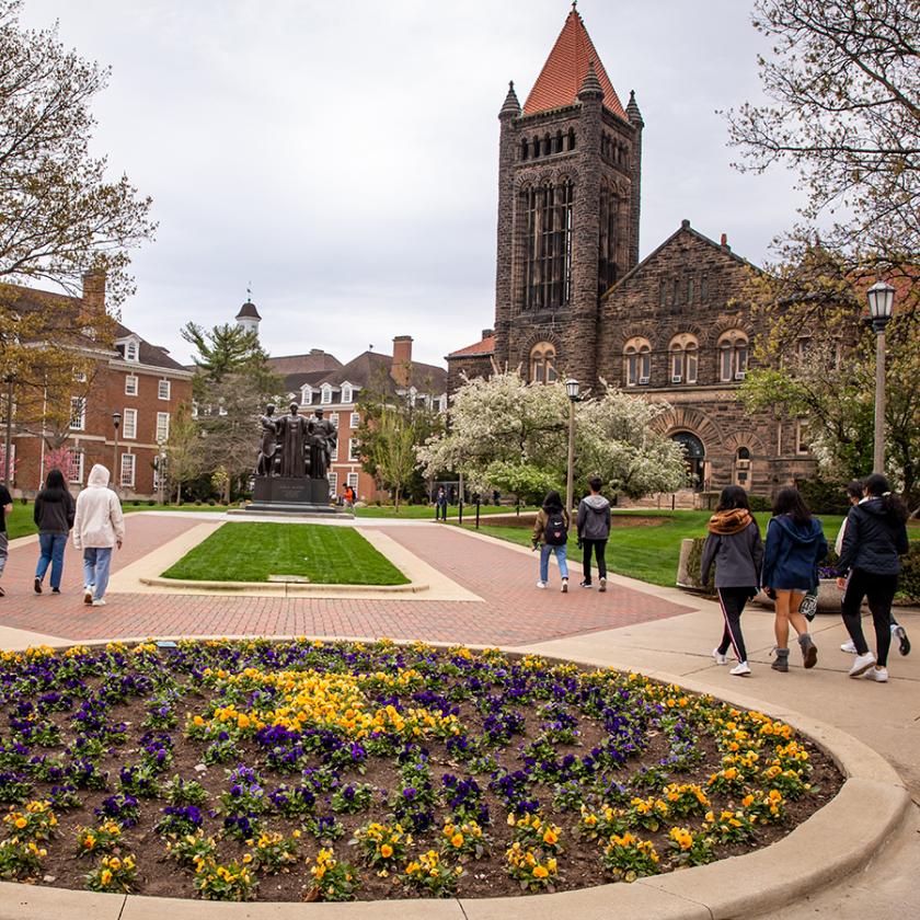 Altgeld with students in front and flowers