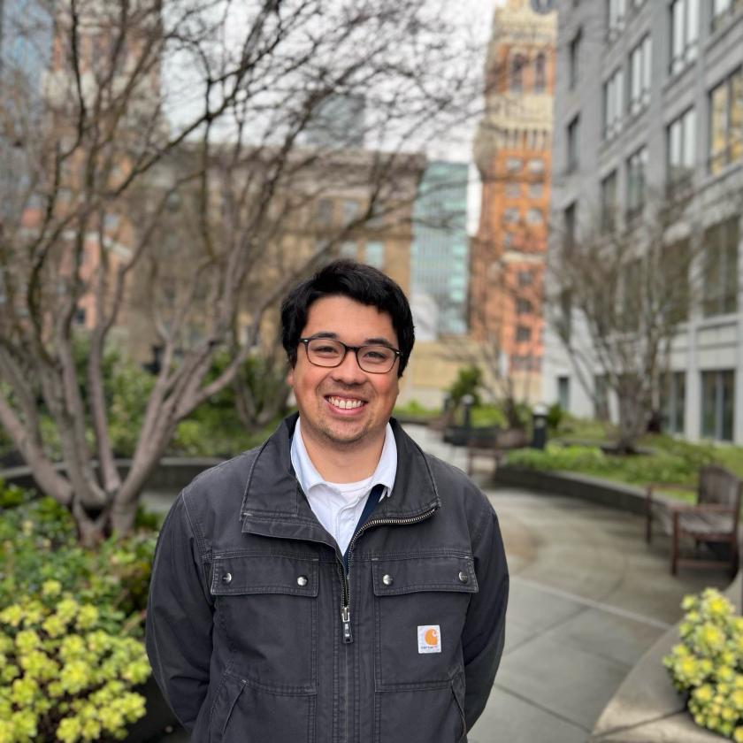 Andrew Stranahan stands outside UC Legal