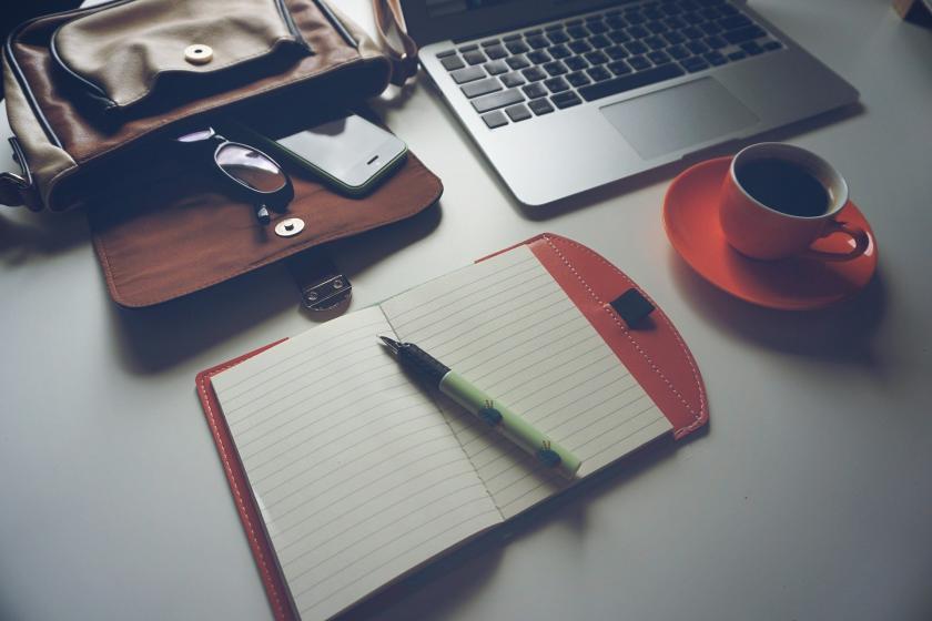 Laptop, cell phone, and notebook