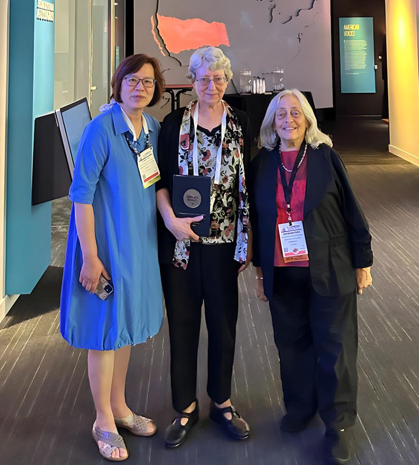 Linda Smith (center) with Clara Chu and Barbara Ford (MSLIS '73) 