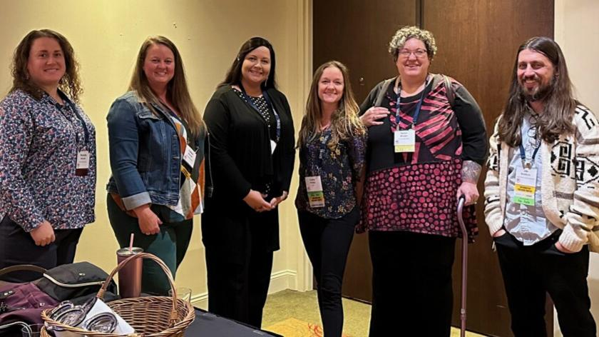 Photograph of Rachelle Brandel, Colleen Norman, Cindy Hohl, 2024 Chair Casey Phillips, Sarah Whalen, and Joe Kohlburn at MLA’s 2023 Pre-Conference Training. Past and current members not pictured: Kris Dyer, Otter Bowman, Kimberly Moeller, & Krystal Smith. Photo courtesy Missouri Library Association Intellectual Freedom Committee.