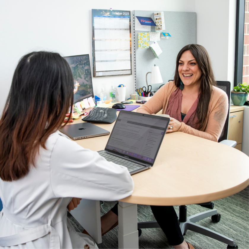 Advisor talking with student