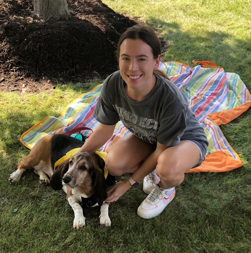 Paige Schulz with her basset hound