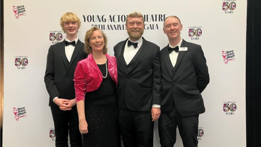 Paul Marty and Michelle Kazmer with their children, Evan and John.