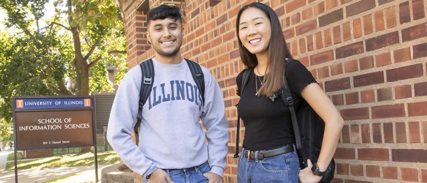 Undergraduate students outside of the iSchool building