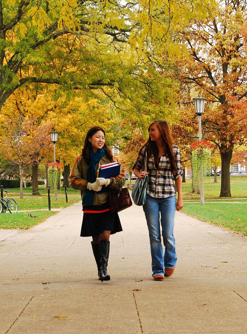students walking on Quad in the fall