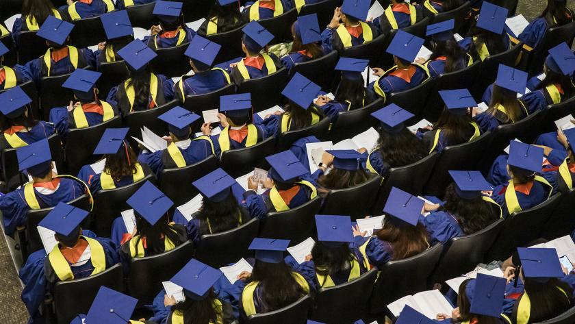 graduates at convocation