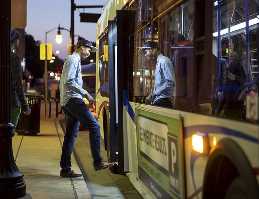Student entering bus