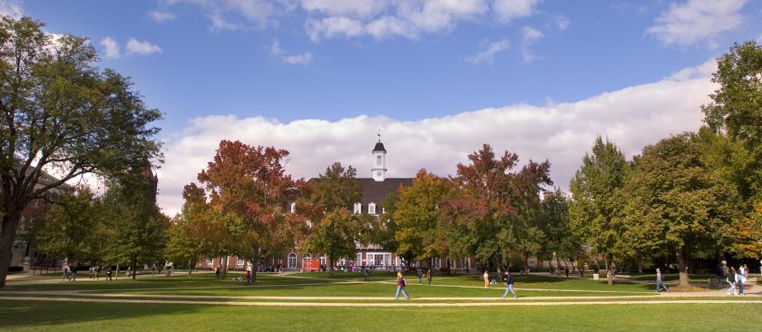 students walk across the U of I Quad