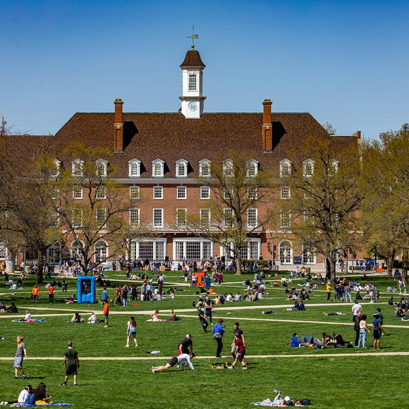 students relaxing on the Quad in front of the Illini Union