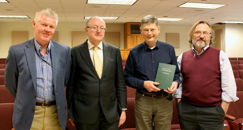 Pictured above are (l-r) Black, van den Heuvel, Rayward, and GSLIS Interim Dean Allen Renear.