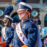 Colin Bertrand playing drums with the Marching Illini. 