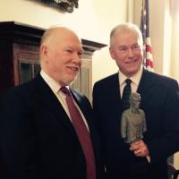 Mark Sorensen (right) receives a Lincoln statuette from Chicago History Museum historian Russell Lewis in the Old State Capitol in recognition of his ISHS Lifetime Achievement Award.