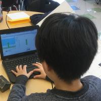 App Authors- student coding at computer